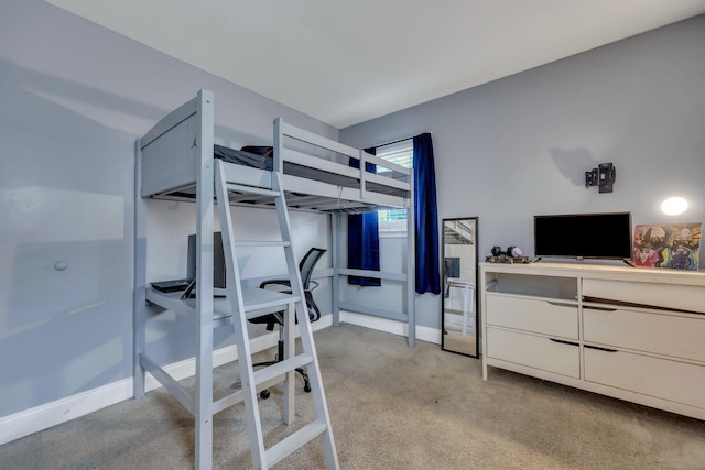 bedroom with light carpet