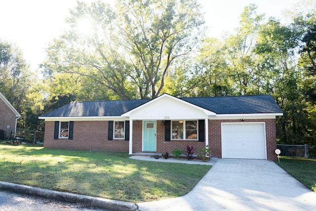 ranch-style house with a front lawn, concrete driveway, fence, and a garage