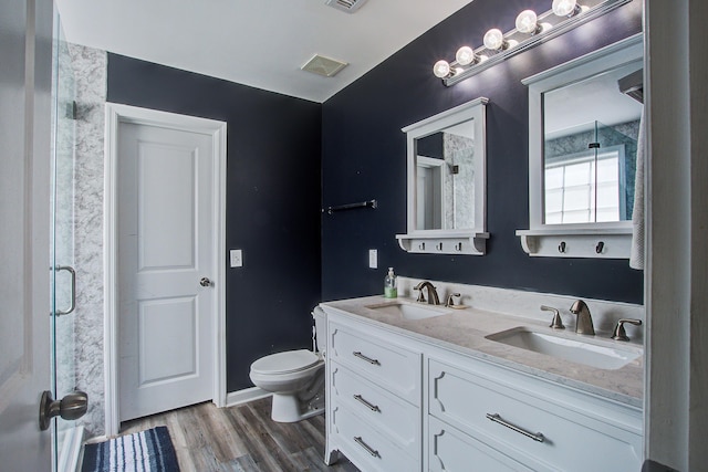 2021 Asher Loop, Summerville, SC 29485 - full bath with toilet, wood finished floors, double vanity, and a shower with shower door