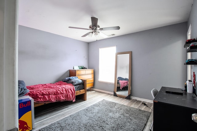 2021 Asher Loop, Summerville, SC 29485 - bedroom featuring wood finished floors, a ceiling fan, and baseboards
