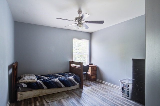 2021 Asher Loop, Summerville, SC 29485 - bedroom with wood finished floors, a ceiling fan, and baseboards