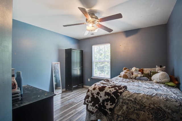 2021 Asher Loop, Summerville, SC 29485 - bedroom with light wood-style flooring, baseboards, and ceiling fan