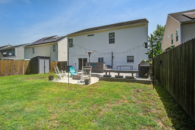 2021 Asher Loop, Summerville, SC 29485 - back of property with a patio area and an outdoor fire pit