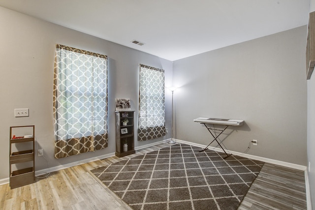 2021 Asher Loop, Summerville, SC 29485 - unfurnished room featuring wood finished floors and baseboards