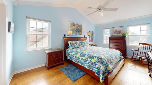 bedroom with vaulted ceiling, ceiling fan, baseboards, and light wood-style floors