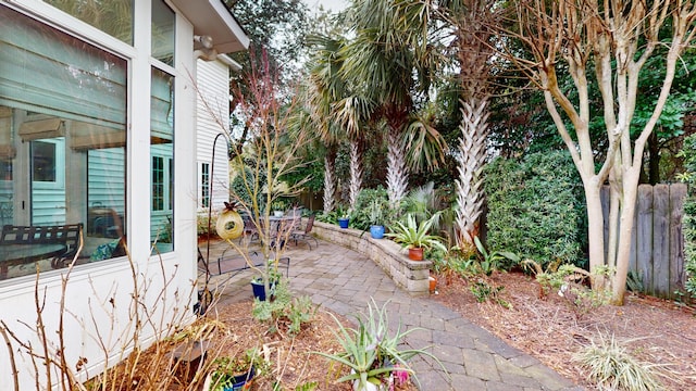 view of yard with outdoor dining area and a patio area