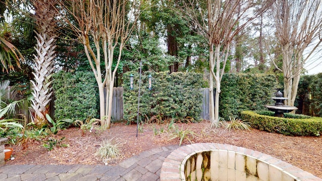 view of patio / terrace featuring fence