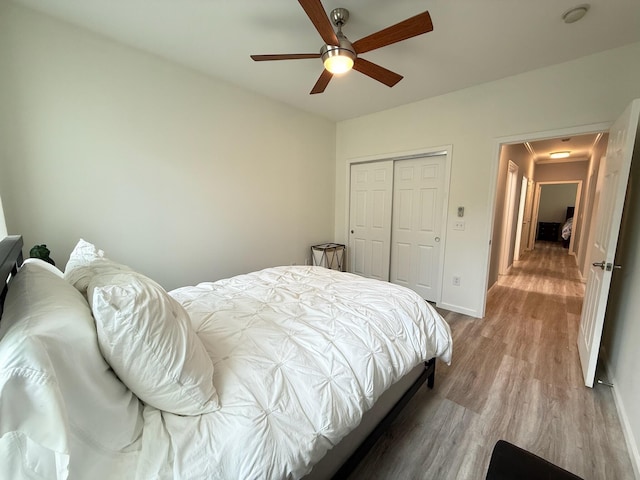 1225 Blakeway St Unit 906, Charleston, SC 29492 - bedroom with attic access, light wood-type flooring, baseboards, a closet, and a ceiling fan