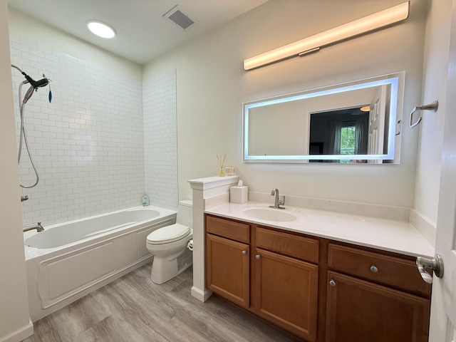 1225 Blakeway St Unit 906, Charleston, SC 29492 - full bath featuring toilet, vanity, tub / shower combination, and wood finished floors
