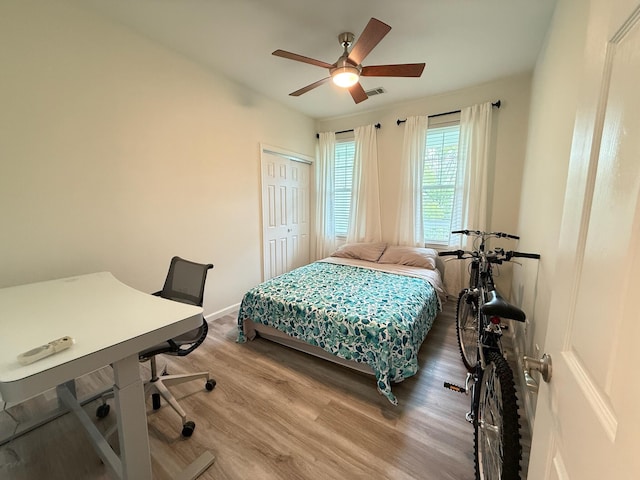 1225 Blakeway St Unit 906, Charleston, SC 29492 - bedroom with wood finished floors, baseboards, a closet, ceiling fan, and a desk