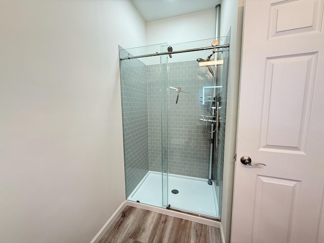 1225 Blakeway St Unit 906, Charleston, SC 29492 - bathroom featuring wood finished floors, a stall shower, and baseboards