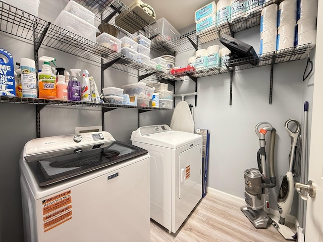 1225 Blakeway St Unit 906, Charleston, SC 29492 - laundry room with washer and clothes dryer, light wood-type flooring, and baseboards