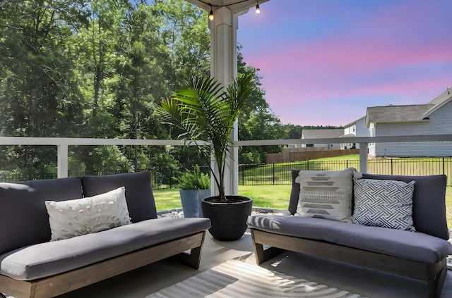 1132 Wading Point Blvd, Huger, SC 29450 - deck at dusk with an outdoor living space and a patio area