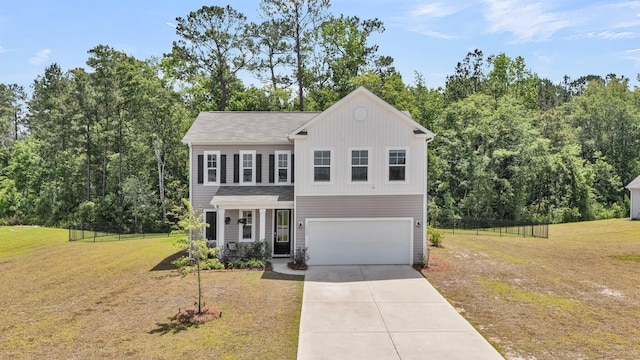 1132 Wading Point Blvd, Huger, SC 29450 - view of front of home featuring a garage, driveway, and board and batten siding