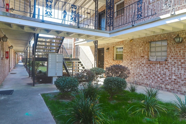 property entrance with brick siding