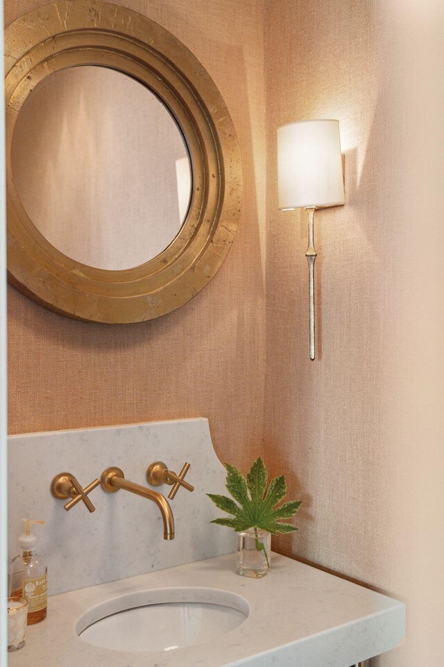 bathroom with vanity and hardwood / wood-style floors