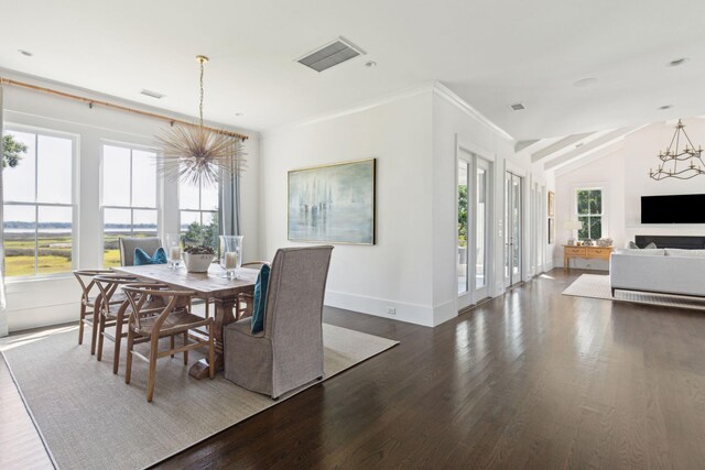 kitchen featuring a center island with sink, white cabinetry, dark hardwood / wood-style flooring, and lofted ceiling with beams