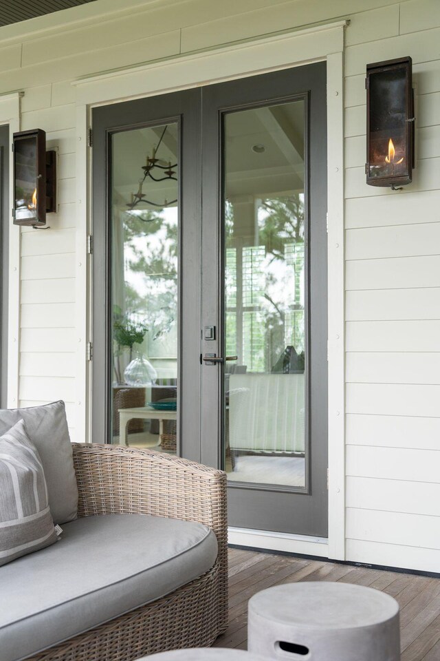 sunroom with plenty of natural light and ceiling fan