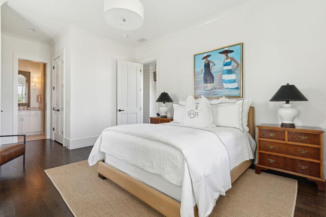 bedroom featuring multiple windows, ornamental molding, and dark hardwood / wood-style floors