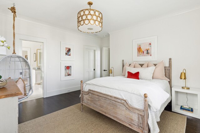 bathroom featuring a wealth of natural light, a bathing tub, and hardwood / wood-style floors