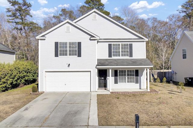 front facade with a garage, a front yard, and a porch