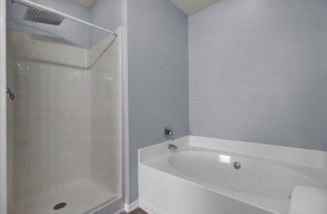 bathroom with independent shower and bath