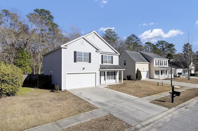 view of front property with a front yard and a garage