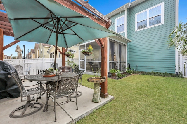 view of patio / terrace with a sunroom