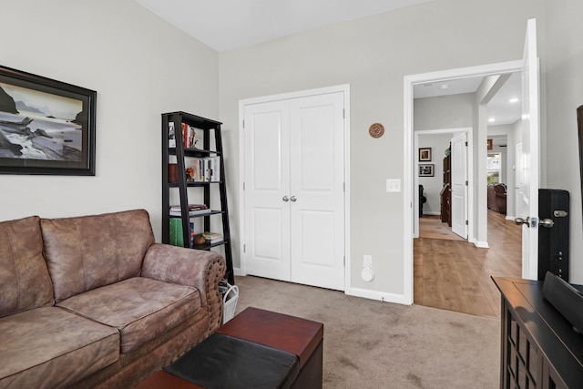 living room with light hardwood / wood-style flooring