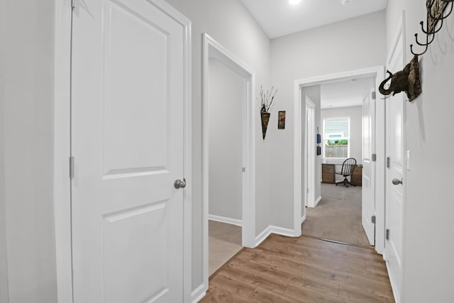 hallway featuring light hardwood / wood-style floors