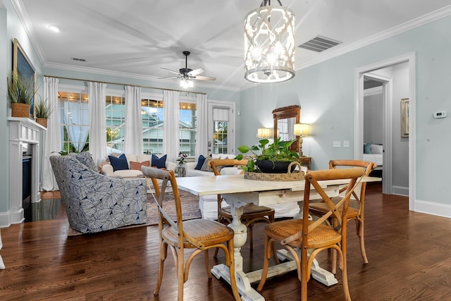 2792 River Vista Way, Mount Pleasant, SC 29466 - dining room with a ceiling fan, wood finished floors, ornamental molding, baseboards, and a fireplace
