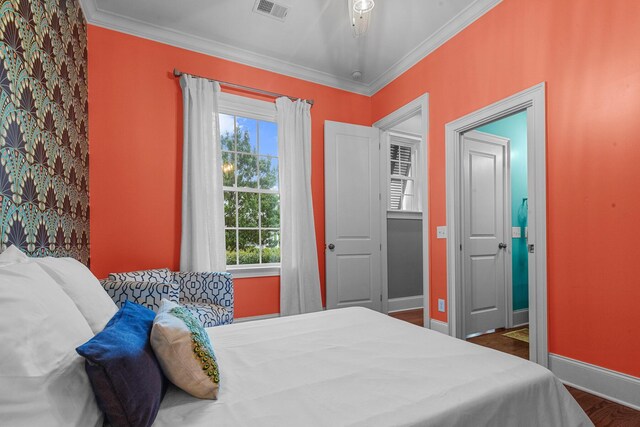 2792 River Vista Way, Mount Pleasant, SC 29466 - bedroom featuring baseboards, ornamental molding, multiple windows, and wood finished floors