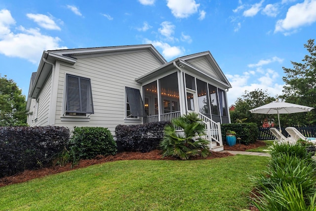 2792 River Vista Way, Mount Pleasant, SC 29466 - rear view of house with a lawn and a sunroom