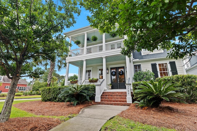 2792 River Vista Way, Mount Pleasant, SC 29466 - view of front of property featuring a balcony, covered porch, a shingled roof, and french doors