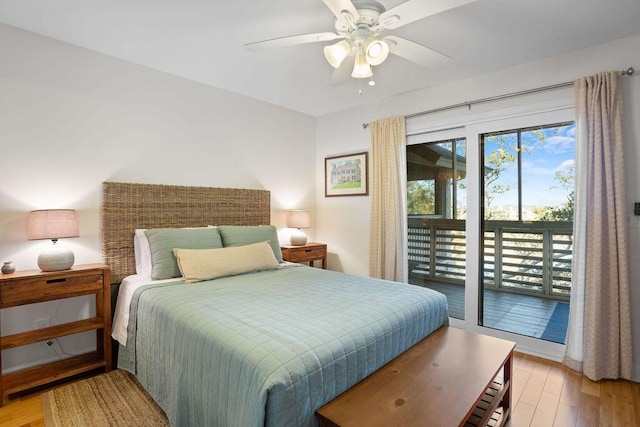 bedroom featuring access to exterior, light hardwood / wood-style floors, and ceiling fan