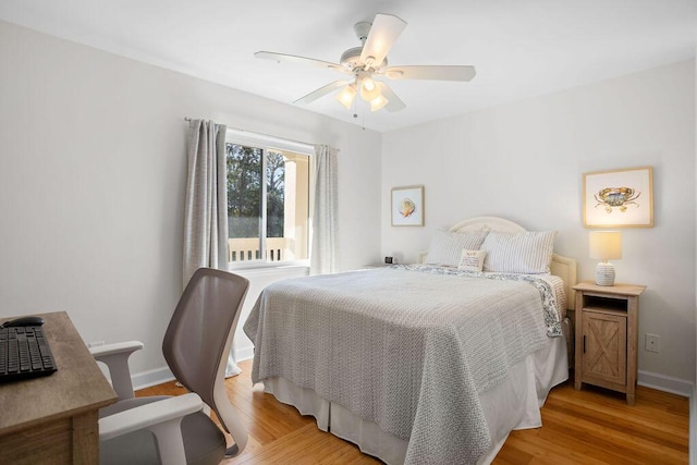 bedroom with ceiling fan and light wood-type flooring