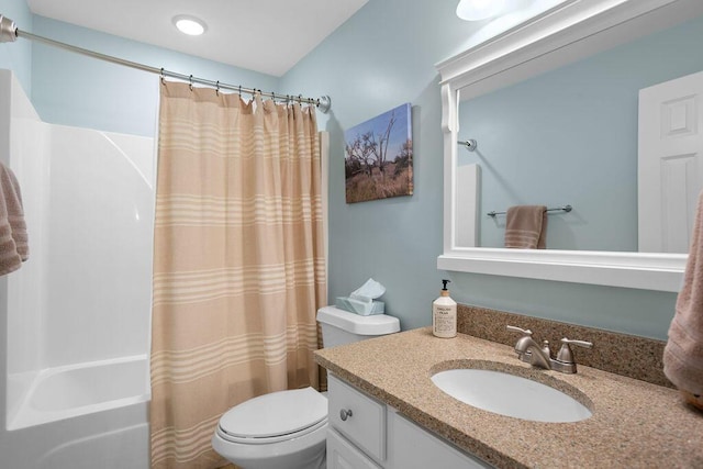 full bathroom with vanity, toilet, and shower / bath combo with shower curtain