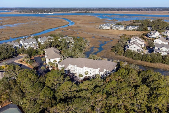 bird's eye view with a water view