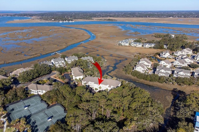 birds eye view of property featuring a water view