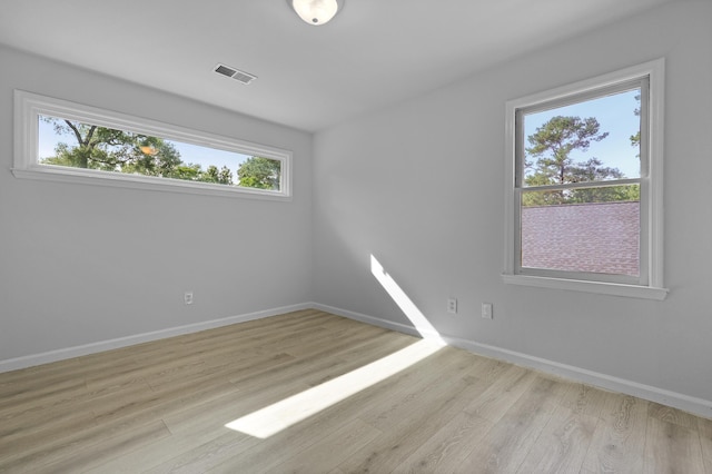 123 Lewisfield Dr, North Charleston, SC 29418 - unfurnished room with plenty of natural light, wood finished floors, and baseboards
