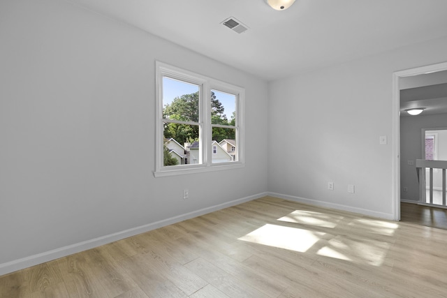 123 Lewisfield Dr, North Charleston, SC 29418 - spare room featuring light wood-type flooring, plenty of natural light, and baseboards