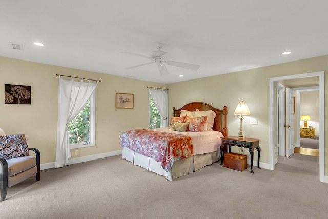 carpeted bedroom featuring ceiling fan