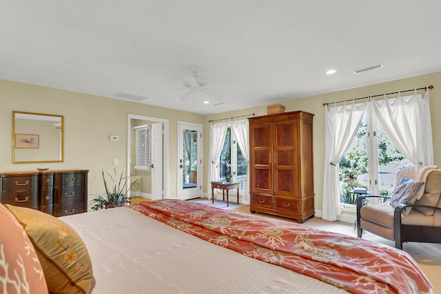 bedroom featuring access to exterior, ceiling fan, and multiple windows