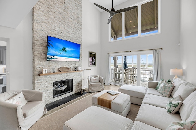 1948 Marsh Oak Ln, Seabrook Island, SC 29455 - living room with a towering ceiling, a fireplace, and ceiling fan