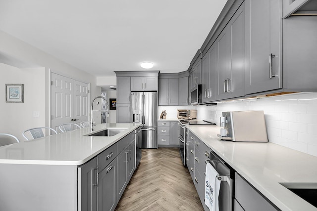 1948 Marsh Oak Ln, Seabrook Island, SC 29455 - kitchen with a sink, stainless steel appliances, gray cabinetry, and light countertops