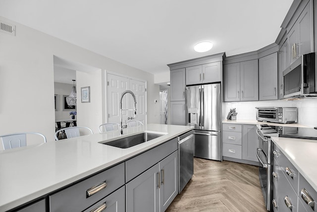 1948 Marsh Oak Ln, Seabrook Island, SC 29455 - kitchen with stainless steel appliances, gray cabinetry, and a sink