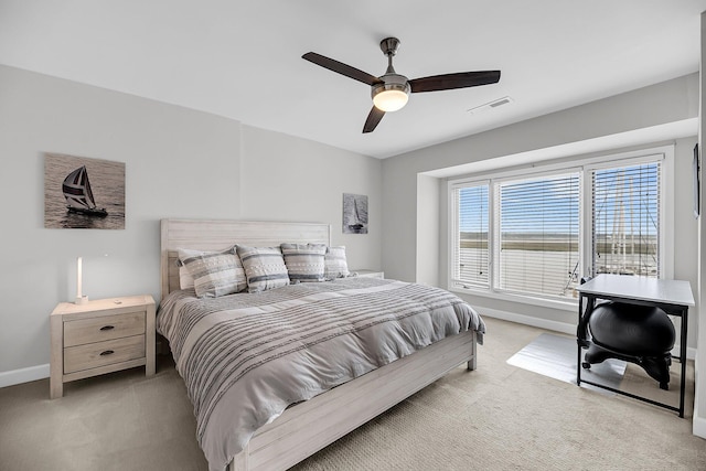 1948 Marsh Oak Ln, Seabrook Island, SC 29455 - bedroom featuring light carpet, baseboards, and a ceiling fan