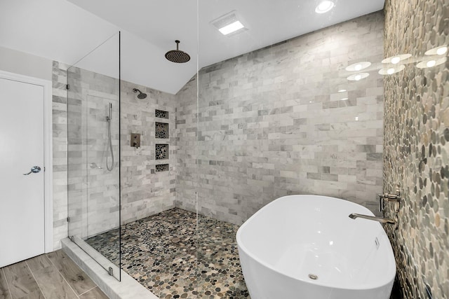 1948 Marsh Oak Ln, Seabrook Island, SC 29455 - full bathroom with tile walls, a shower stall, a freestanding tub, and recessed lighting