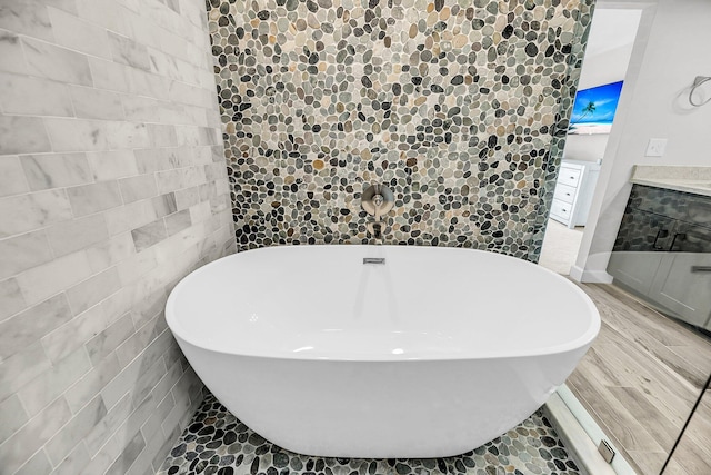 1948 Marsh Oak Ln, Seabrook Island, SC 29455 - full bathroom with a soaking tub, tile walls, and vanity