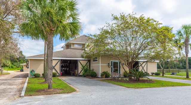 1948 Marsh Oak Ln, Seabrook Island, SC 29455 - view of front of home featuring driveway and a shingled roof